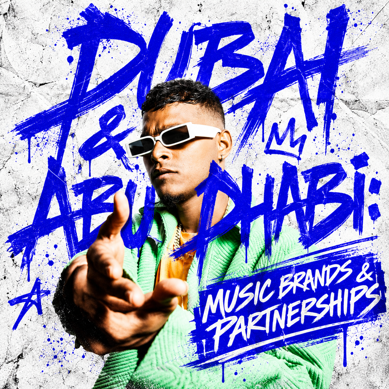 Dubai and Abu Dhabi music brands cover with a performer in a green jacket and blue script.