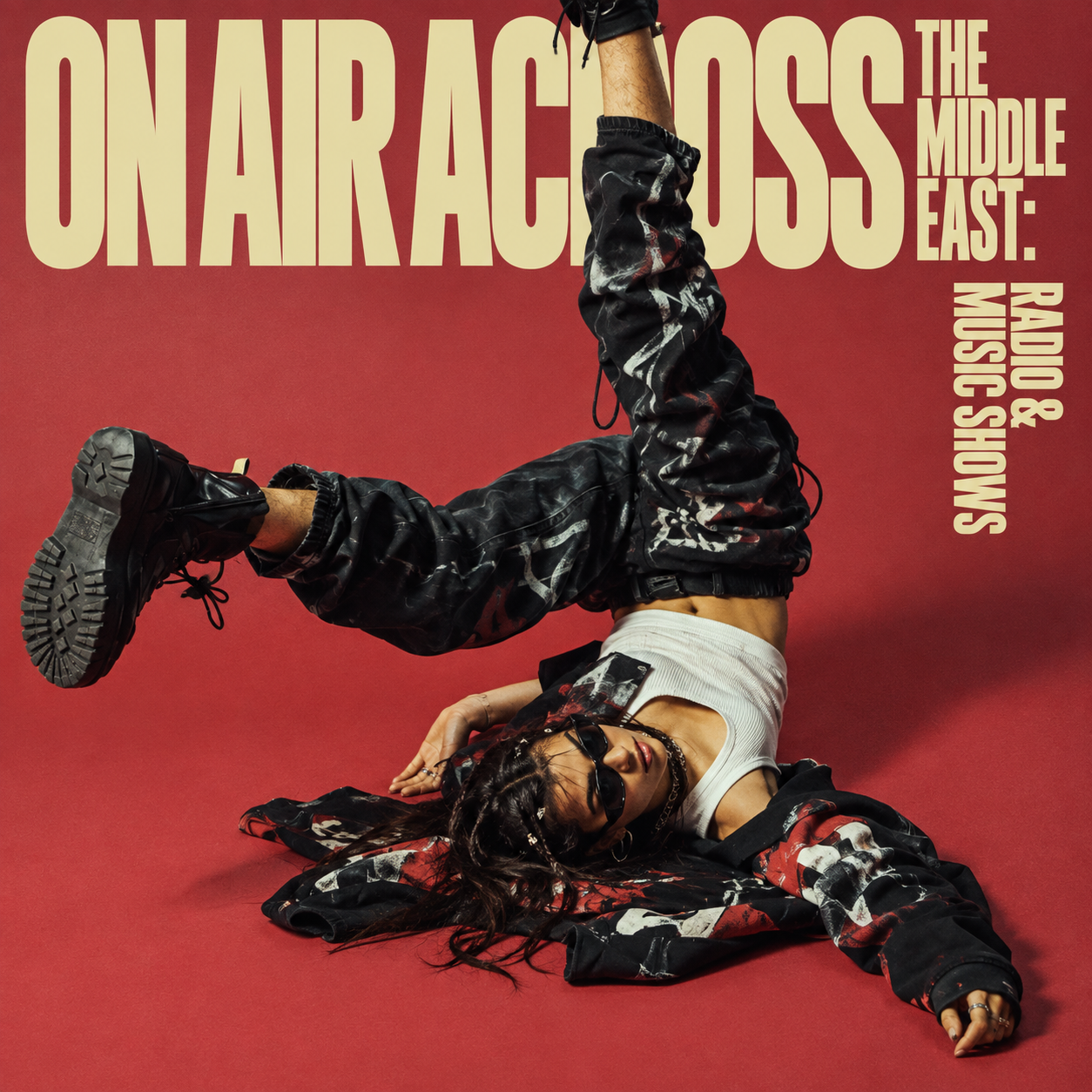 Middle East radio and music shows cover with a dancer against a red backdrop.